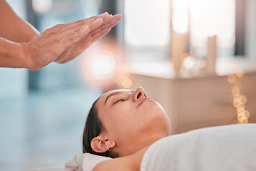 Image showing Reiki, energy and light with head of woman in spa for alternative medicine, spiritual healing or traditional massage. Relax, wellness and peace with hands of healthcare expert for holistic treatment