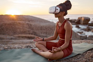 Image showing Woman, metaverse or vr headset in yoga meditation by beach, ocean waves, sea water in mental health support, zen app or 3d peace ai. Lotus, relax or wellness person on virtual reality chakra software