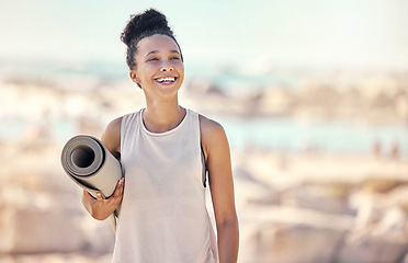 Image showing Yoga, fitness and beach black woman thinking of meditation or zen lifestyle in summer sunshine for outdoor healing, wellness and peace. Pilates, sports and healthy woman with training gear by a sea