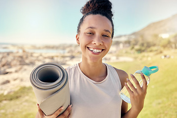 Image showing Nature, fitness and black woman with bottle and yoga mat ready to begin exercise, workout and training. Summer, yoga and portrait of young female with water exercising for health wellness by ocean
