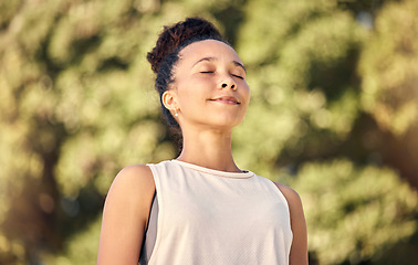 Image showing Black woman, happy and doing meditation exercise breathing, smile and outdoor for wellness, being calm in nature. Bokeh, African American female and healthy girl being peaceful, workout and yoga.