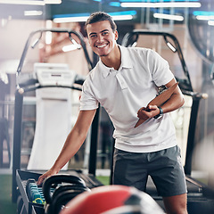 Image showing Training, portrait and fitness coach doing inspection of equipment at the gym. Wellness, sport and happy trainer doing check, planning and working at a club for athlete health, sports and workout