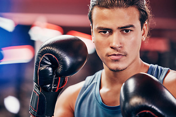 Image showing Boxing, boxer and man with fitness boxing gloves in portrait, sport training and motivation for healthy life. Athlete, martial arts or mma fighter with exercise and workout, wellness and cardio.