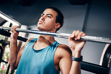 Image showing Fitness, man and weightlifting barbell at the gym for heavy workout, training or intense sports exercise. Male body builder lifting weights for strength, muscle and endurance for strong arms indoors