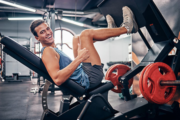 Image showing Gym, thumbs up and leg press in gym, smile and happy for fitness development, success and good workout. Portrait of male training, motivation and wellness with hand gesture for like, emoji and yes