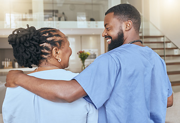 Image showing Support, care and nurse with a senior black woman for healthcare, medical trust and consultation in a nursing home. Back of African man in medicine helping elderly patient while consulting at house