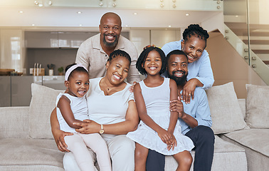 Image showing Happy black family, portrait smile and sofa relaxing together for quality bonding or break at home. Mother, father and grandparents with kids smiling in relax for family time on living room couch