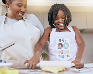 Image showing Black woman, girl or bonding and baking in kitchen of house or family home with help, support or learning education with mom. Smile, happy and cooking child with mother and pastry for food or dessert