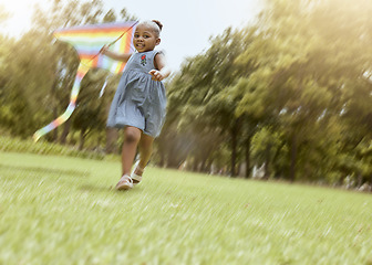 Image showing Girl, running with kite and nature park for happy, fun outdoor activity and freedom run in summer making childhood memory. Playful child, grass field and black kid playing outside on nature holiday