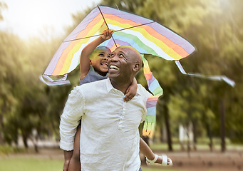 Image showing Father, child and rainbow kite outdoor at a nature park for fun, bonding and trust of life insurance and savings of a black family having fun. Black man giving girl piggy back ride on vacation