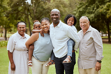 Image showing Big family, happiness and love while outdoor at a park for bonding, support and quality time on vacation with children, parents and grandparents. Portrait of men, women and kids in nature for fun