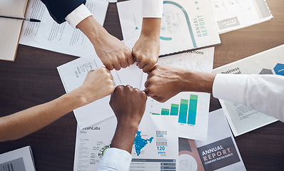 Image showing Hands, team and analytics in business meeting for collaboration, agreement or partnership at the office. Hand of employee group in fist bump for analysis strategy, teamwork or unity at the workplace