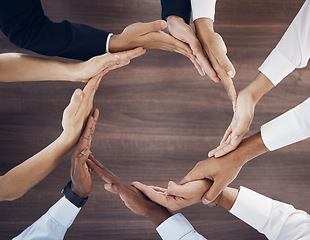 Image showing Business diversity, hands and circle for teamwork, unity or trust in support for work collaboration at the office. Hand of diverse employee group in solidarity for agreement, community or partnership