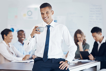 Image showing Businessman, office and meeting with coffee in portrait at workplace with confidence, energy or happy. Finance manager, smile or happiness for project management, leadership or teamwork in accounting