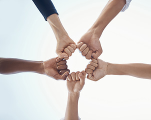 Image showing Fist bump, support and trust in team with team building motivation and success together. Hands, fist and teamwork, community with collaboration and partnership, diversity with group connection.