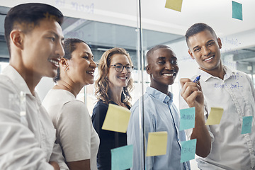 Image showing Business people, planning and team brainstorming with sticky notes for idea, strategy or collaboration at the office. Happy creative employee workers in room, schedule or teamwork plan for project