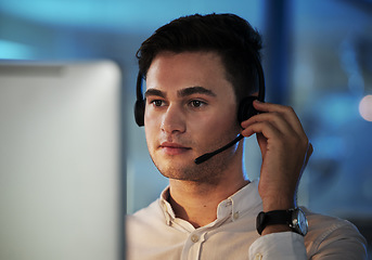 Image showing Call center, telemarketing and support with a man consulting using a headset for communication in his office. Contact us, crm and customer service with a male consultant working in retail or sales
