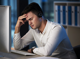 Image showing Stress, call center and customer service with a man consultant suffering with burnout while working late at night. Crm, ecommerce and compliance with a male employee working in retail or sales
