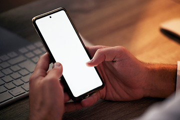 Image showing Hands, phone and mock up in night office for marketing or advertising. Mockup space, tech and man networking on 5g mobile, social media or texting online, checking email or scrolling on smartphone.