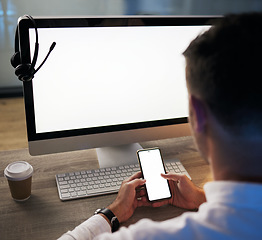 Image showing Mockup, working and man with phone and computer at desk, online in call center office. Telemarketing, crm and businessman with blank screen on smartphone and pc for advertising, design and marketing