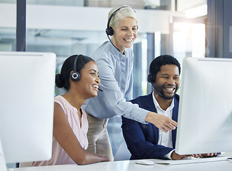 Image showing Call center, customer support and manager helping consultants with online consultation in office. Crm, contact us and senior leader consulting telemarketing agents about a ecommerce sale in workplace