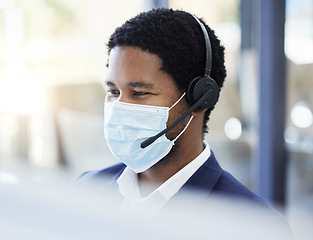 Image showing Covid, black man and call center for customer communication with mask for professional consultation. Virus, safety and telemarketing expert consulting in office with face mask in corona pandemic.