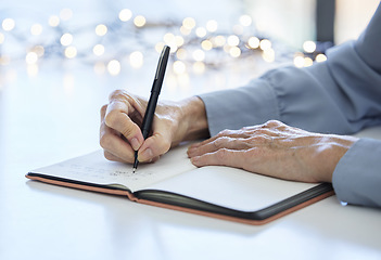 Image showing Notebook, pen and hands of old woman writing calendar schedule, checklist or business ideas in planner. Alzheimer, dementia and elderly care person with memory loss takes daily notes on journal paper