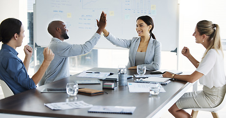 Image showing Business meeting, high five and corporate team celebrate target, profit and success of development, marketing and teamwork. Diversity, management and happy, men and women support mission and vision