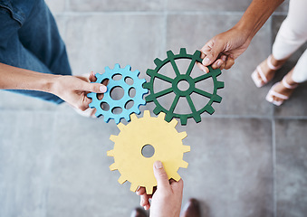 Image showing Settings, gear icon and teamwork with business people or team together for collaboration and synergy with cog wheel strategy. Office group hands for problem solving, innovation and development