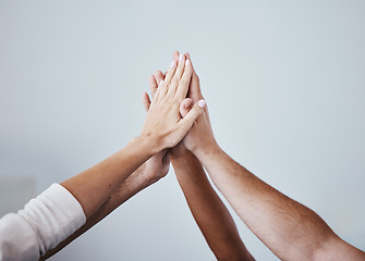 Image showing High five, team and hands of people in celebration for teamwork achievement, team building meeting or collaboration. Group solidarity, support and community friends celebrate charity mission success