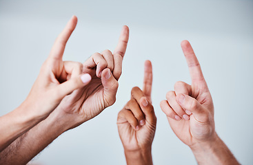 Image showing Fingers, group and people answer question with hands sign for ideas in meeting and collaboration for office teamwork. Vote decision, business knowledge for professional thinking and company workshop