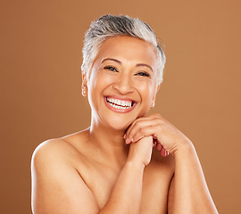 Image showing Happy senior woman, skincare beauty portrait from healthy spa facial and clean natural face in aesthetic studio. Luxury sunscreen wellness, indian person with cosmetic smile and brown background