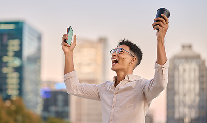 Image showing Success, celebration and man with phone in the city for trading business and winning online gaming in Singapore. Winner, motivation and happy businessman in celebration for achievement on mobile