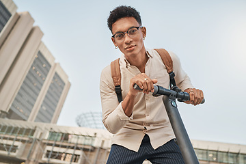 Image showing Scooter, city and portrait of a student man for travel and transportation with carbon footprint, eco friendly and urban lifestyle. Young gen z college or university person with an electric scooter