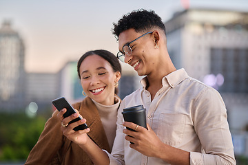 Image showing City, social media and young couple with phone looking at meme, online content and browsing internet. Technology, relationship and man standing with woman in urban town on smartphone together