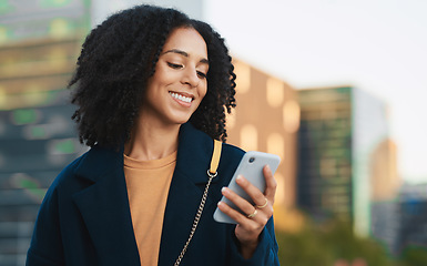 Image showing Business woman, phone and typing in city, street or outdoors on social media, text message or web browsing. Mobile, tech and black female scrolling app on 5g smartphone, networking or texting in town