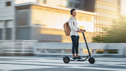 Image showing Electric scooter, travel fast or businessman with transport in city, street or road in London. Employee, worker or designer black man with bike commute to work, office or university in the morning