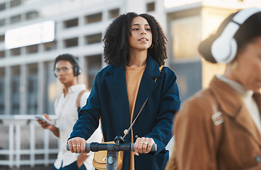 Image showing Travel, scooter and business woman in city or street on eco friendly transportation. Sustainability, technology or black female employee commuting to work on electric moped to reduce carbon footprint