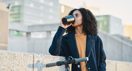 Image showing Drinking coffee, electric scooter and city with a business black woman on her morning commute into work. Tea, transport and carbon footprint with a female employee traveling in an urban town alone