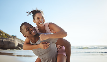 Image showing Fun, black couple and piggyback with happy people on vacation playing and being silly while having fun. Holiday, getaway and african girlfriend and boyfriend play whole being carefree by the sea