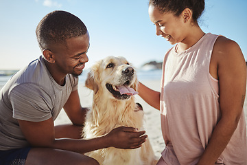 Image showing Love, dog and couple being happy, smile or bonding on beach, vacation or outdoor together. Romance, black man and woman with golden retriever being loving, happiness or relax while walking or holiday