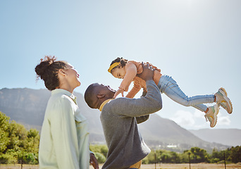 Image showing Black family, nature and parents play with child on weekend countryside vacation for peace, freedom and quality time. Love, trust and fun happy family of mother, father and kid girl bonding together
