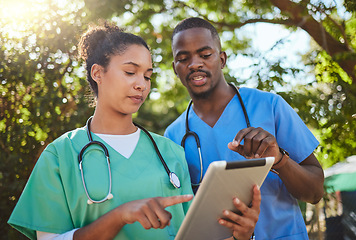 Image showing Medical collaboration, nurse and doctor with tablet consulting exam results of patient healthcare. Clinic employees, hospital appointment and a digital report. Health, medicine discussion and talking