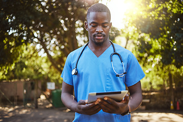 Image showing Veterinary doctor with tablet outside, pet healthcare and black man checking charts and patient info online. Technology, internet and animal care, man working at animal shelter in vet outdoor yard.
