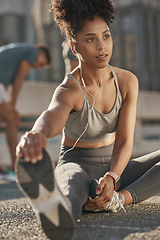 Image showing Black woman, stretching legs and streaming audio yoga fitness podcast before run. Cardio training, healthy lifestyle and listening to music for motivation, peace and relax in workout on city street