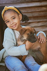 Image showing Pet, love and portrait of girl with dog smiling, happy and having fun playing with animal. Care, happiness and young african american child holding puppy enjoying summer, weekend and outdoors