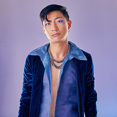 Image showing Asian man, makeup and punk fashion for portrait in studio with cyberpunk, creative or aesthetic face. Futuristic model, metal jewellery or clothes with art, cosmetic or beauty by lavender background