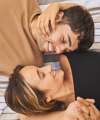 Image showing Top view, love and couple looking happy, smile and together for bonding, romance or relationship. Romantic, man and woman being loving, happiness or intimacy for affection, dating or content to relax