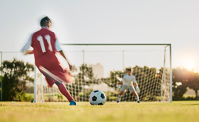 Image showing Soccer, goal post and ball, soccer player running and kicking to score goals, motivation on grass soccer field. Sports, health and fitness exercise training for football game in summer competition.