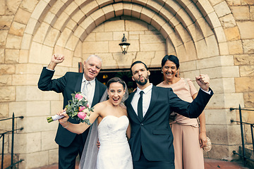 Image showing Wedding, couple and family in marriage celebration for commitment, trust or support for relationship. Portrait of excited married bride and groom with happy parents celebrating in joy at the church
